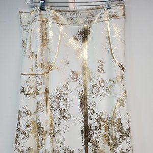 carlucci dressy knee length skirt with stunning gold detail